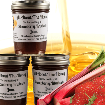 Three jars of strawberry rhubarb jam are shown.